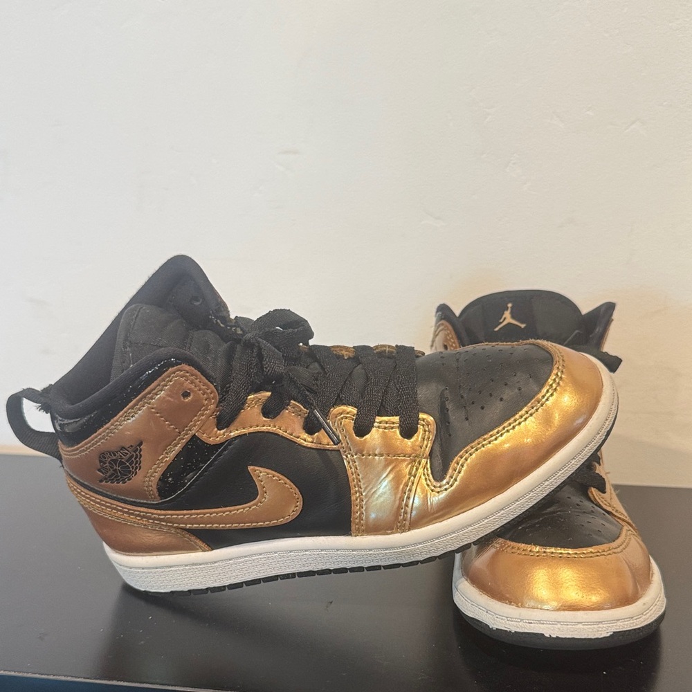 Kids Black and Gold Nike Jordan High-Top Sneakers